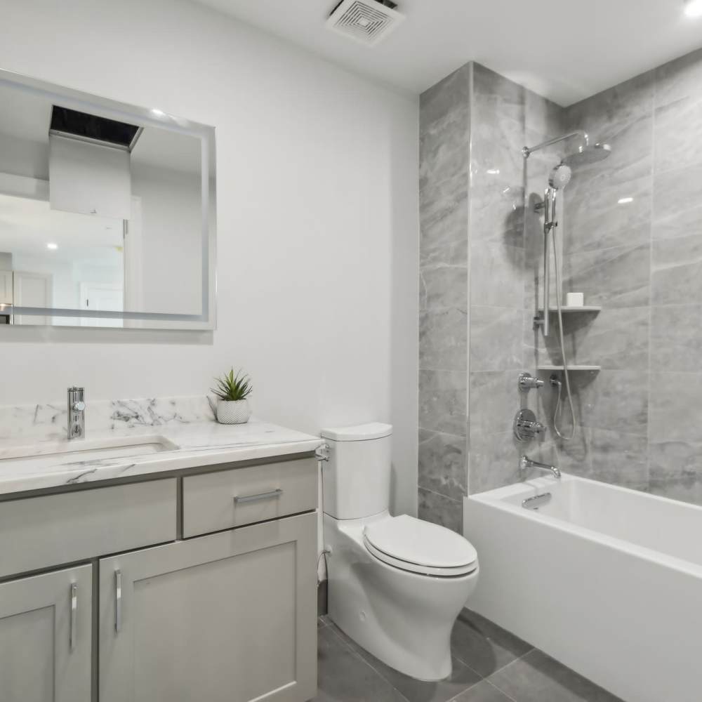 Bathroom with tub and shower at The Magellan in Port Chester, New York