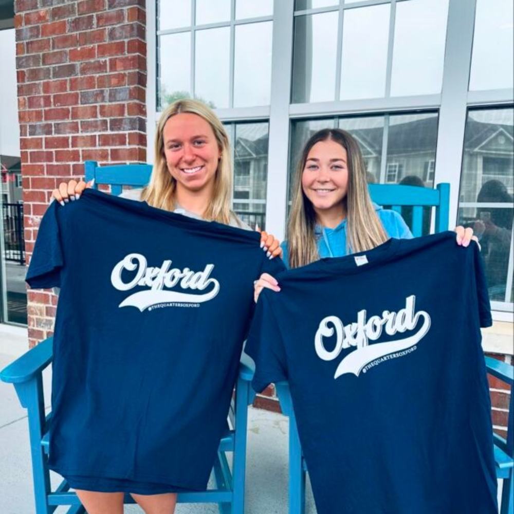 Residents with Oxford shirts at The Quarters at Oxford in Oxford, Mississippi