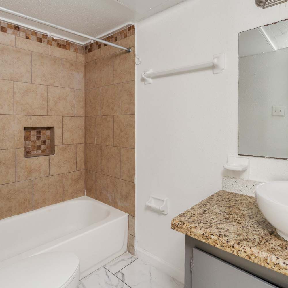 Bathroom with custom shower backsplash at Las Rocas in Houston, Texas
