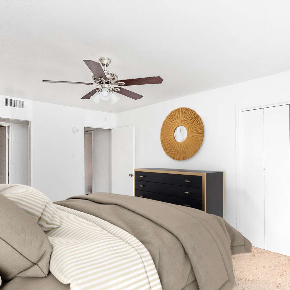 Bedroom with a ceiling fan at Las Rocas in Houston, Texas