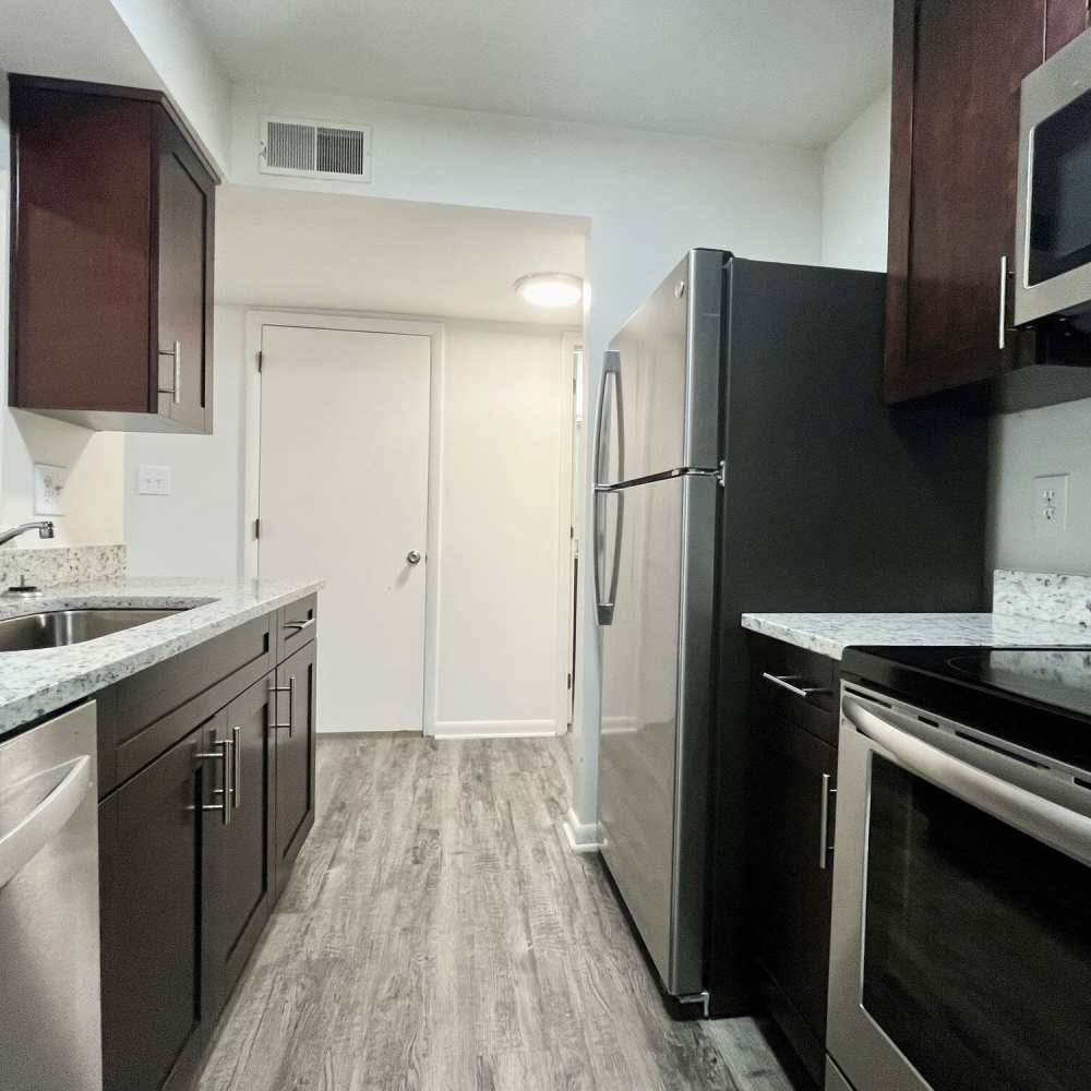 Another kitchen with stainless-steel appliances at Collinwood Apartments in Newport News, Virginia