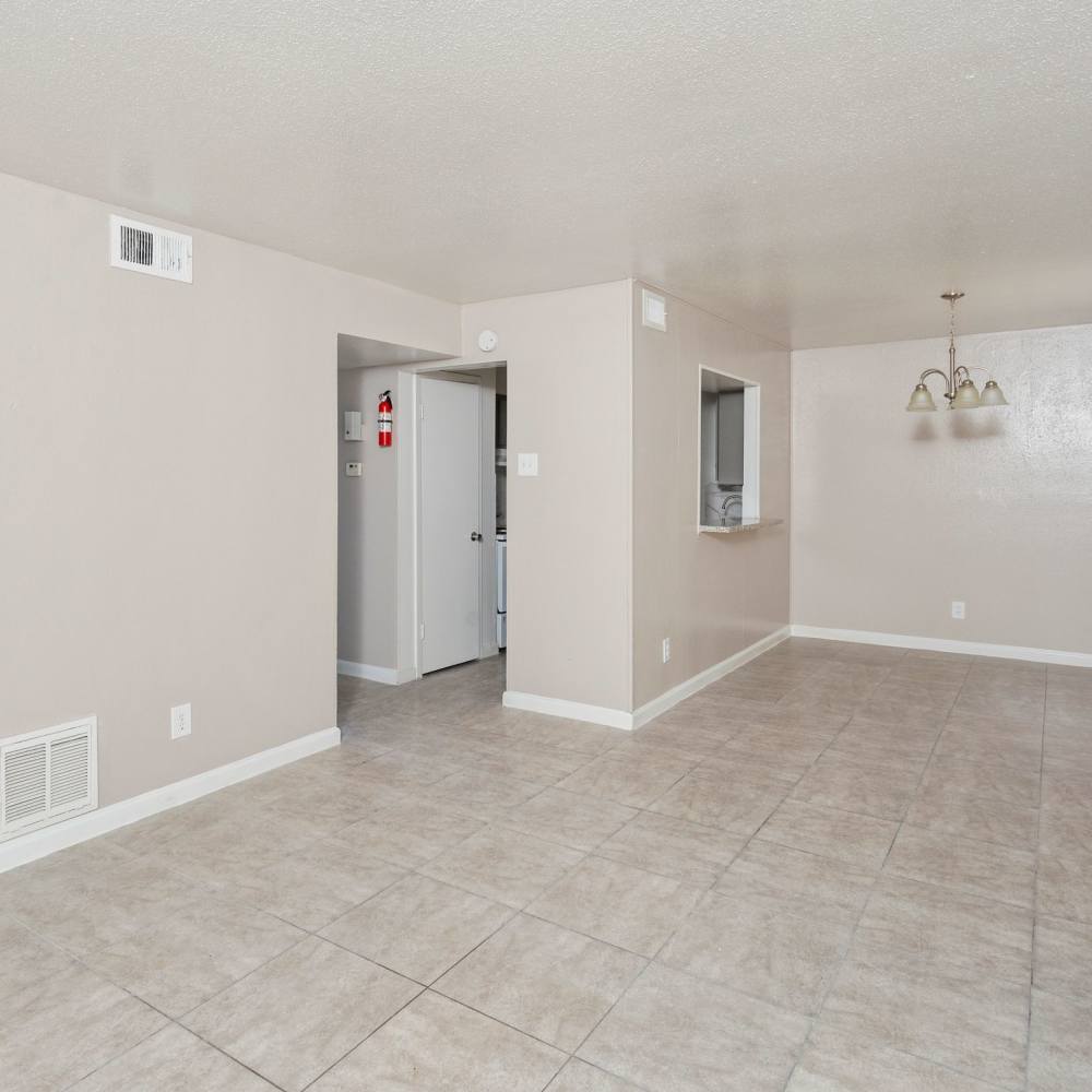 Kitchen and dinning space with tile flooring at La Carmona in Houston, Texas