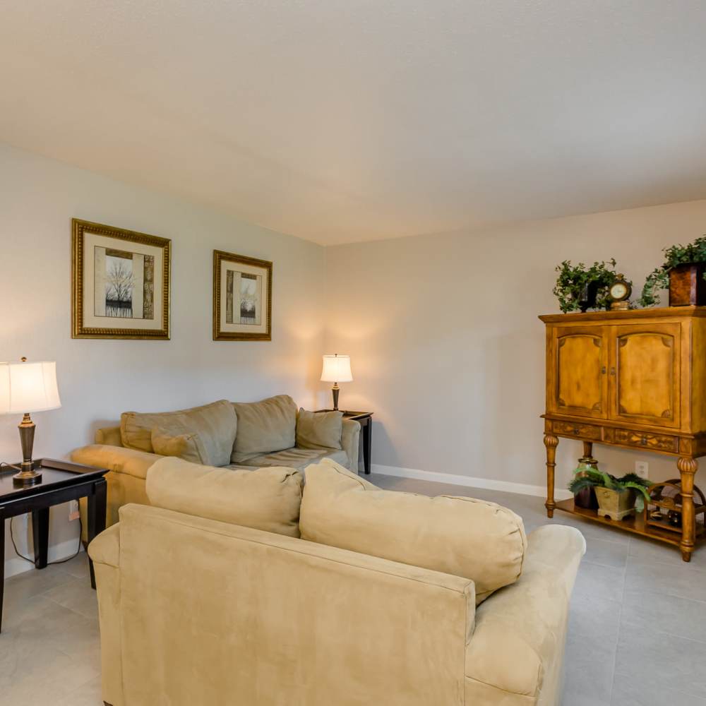 Living space with tile flooring at La Carmona in Houston, Texas