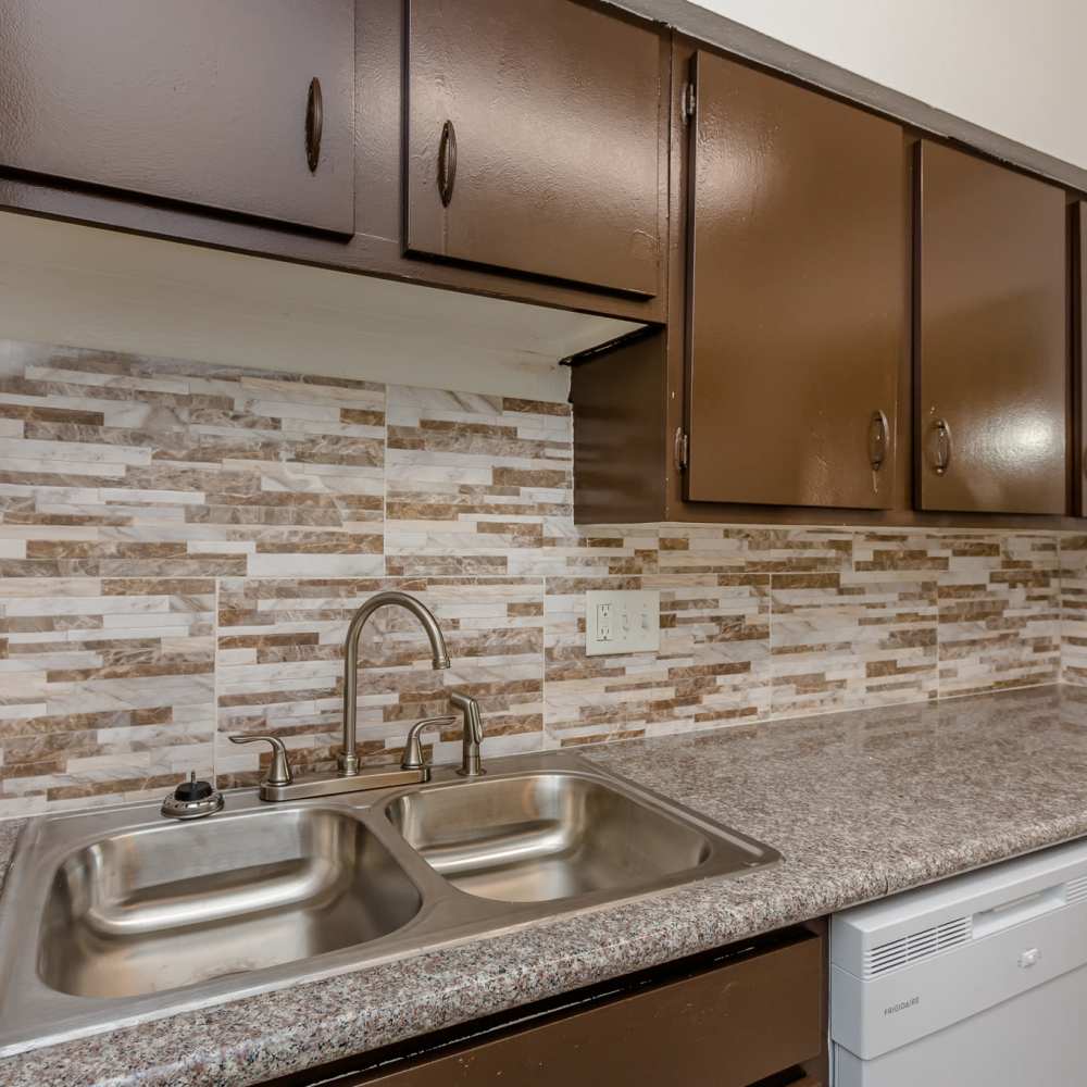 Kitchen with double sinks at La Carmona in Houston, Texas