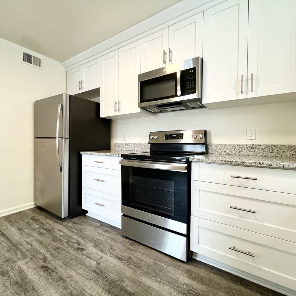 Kitchen with stainless-steel appliances at Great Bridge Apartments in Chesapeake, Virginia