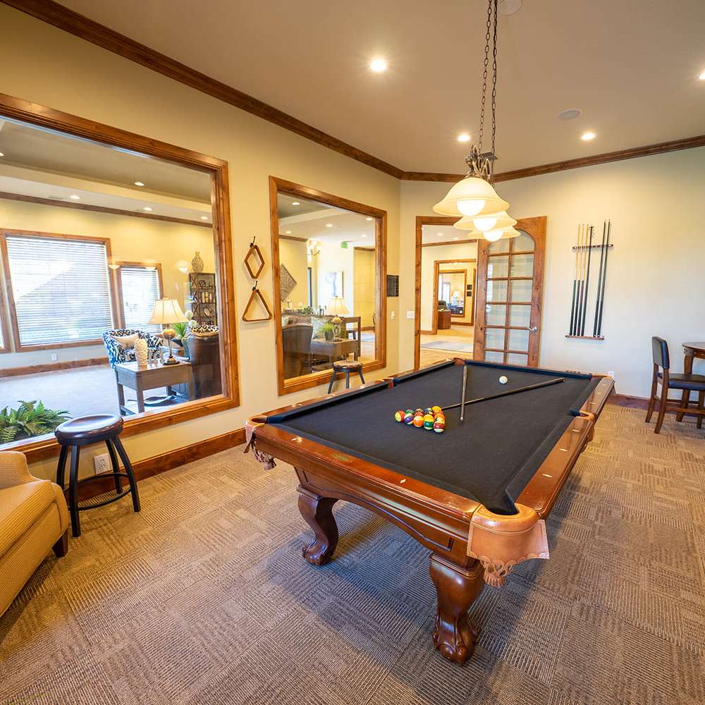 Clubhouse with a billiards table at The Falls at Canyon Rim in South Ogden, Utah