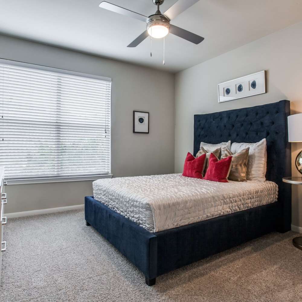 furnished model bedroom at Arboretum Estates in Richardson, Texas