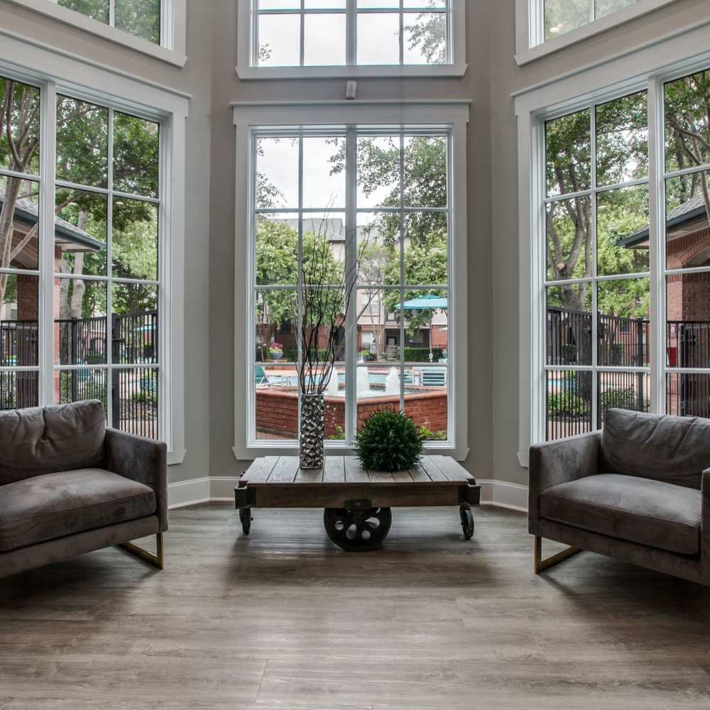 Seating by the windows at the clubhouse at Arboretum Estates in Richardson, Texas