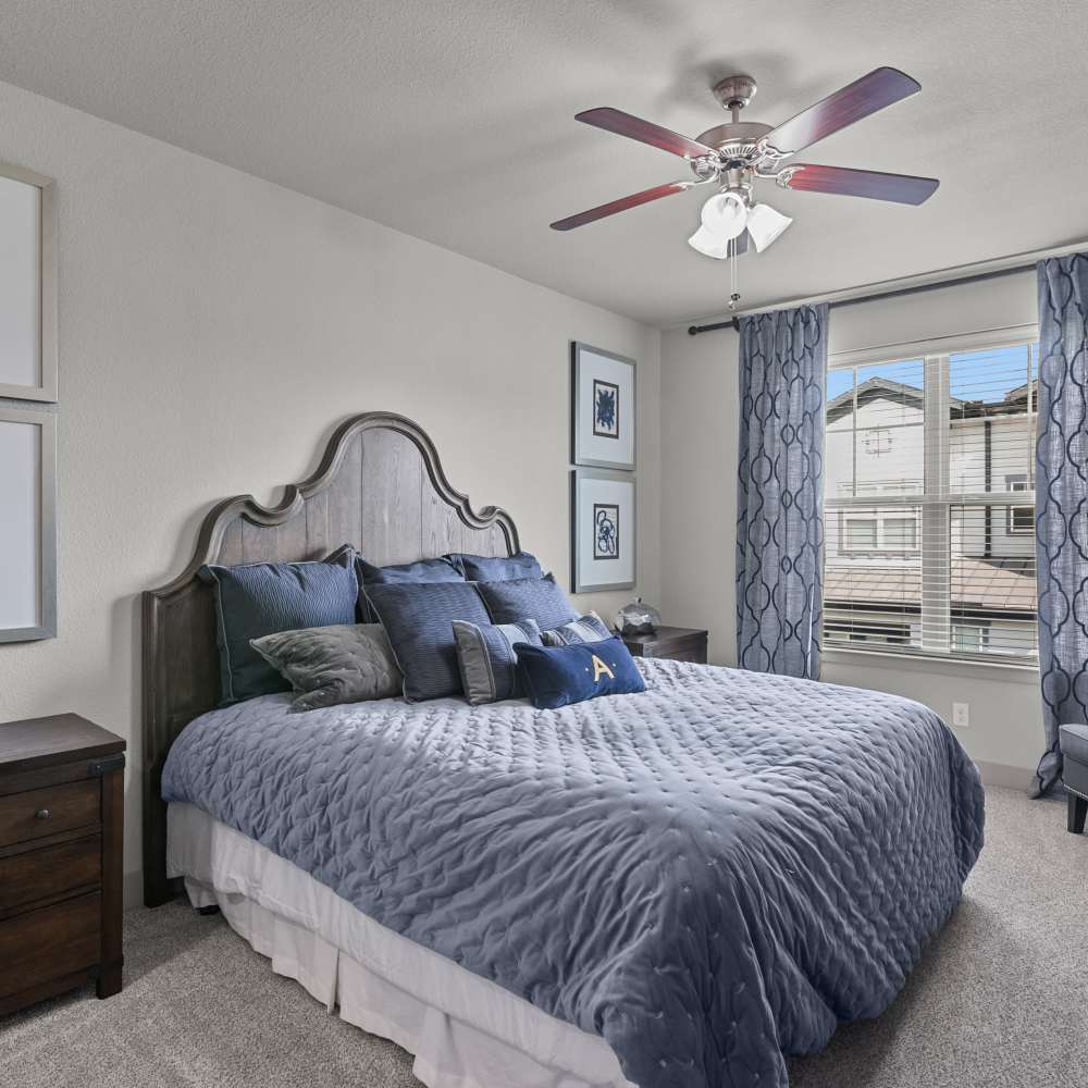 Bedroom with a ceiling fan at Arrabella in Houston, Texas