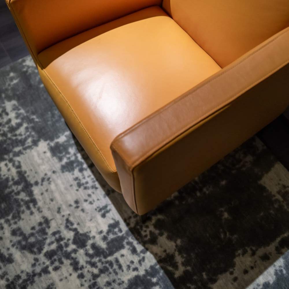 Model room with leather chair 301 Monroe Place in Hoboken, New Jersey
