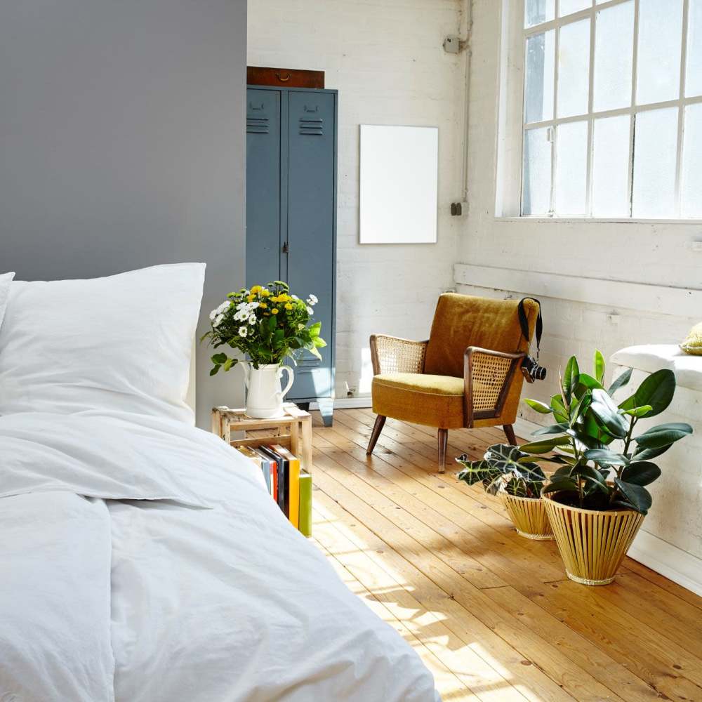 Model bedroom with plants 301 Monroe Place in Hoboken, New Jersey