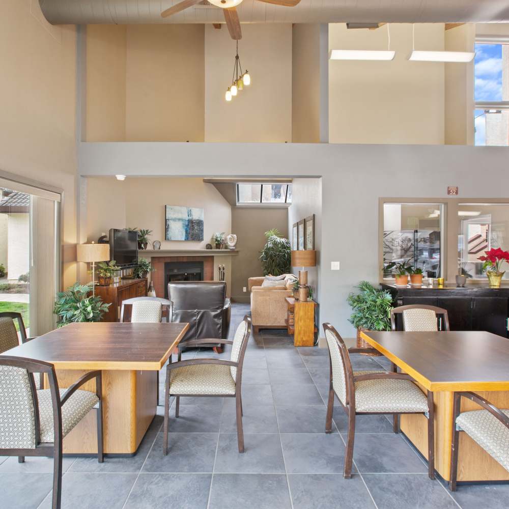 Community rom with tables and chairs at Mission Gardens in Santa Cruz, California