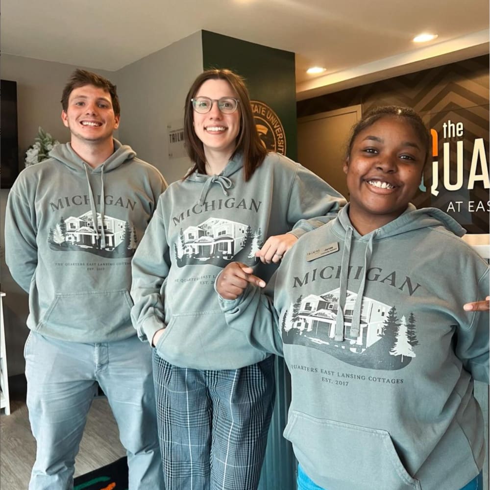 Staff welcoming students at The Quarters at East Lansing in East Lansing, Michigan