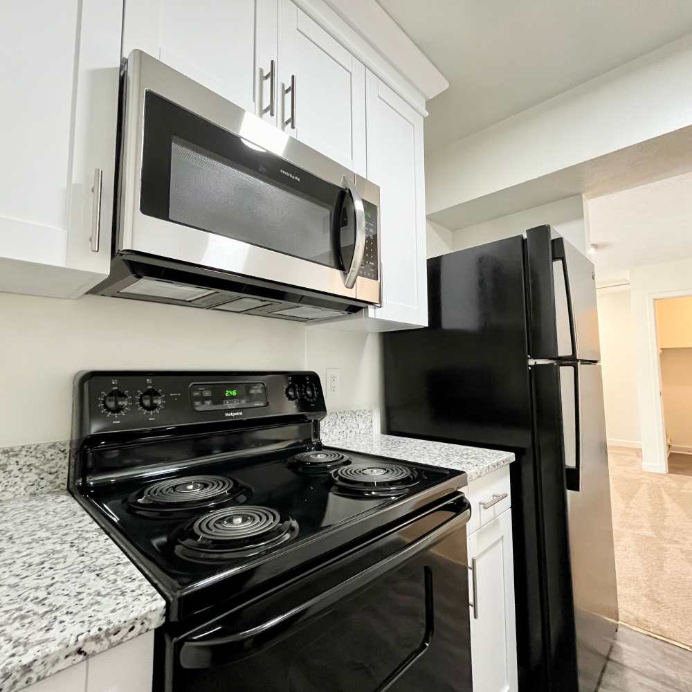 Kitchen with a microwave at Collinwood Apartments in Newport News, Virginia