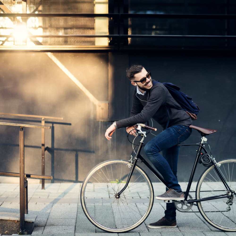 Man on his bike going to work near Lake House in Los Angeles, California