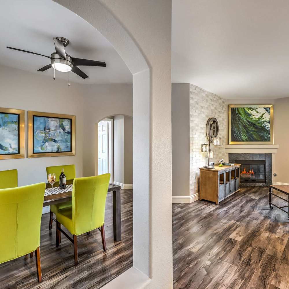 Dinning space with a table and chairs at Parkway Townhomes in Henderson, Nevada