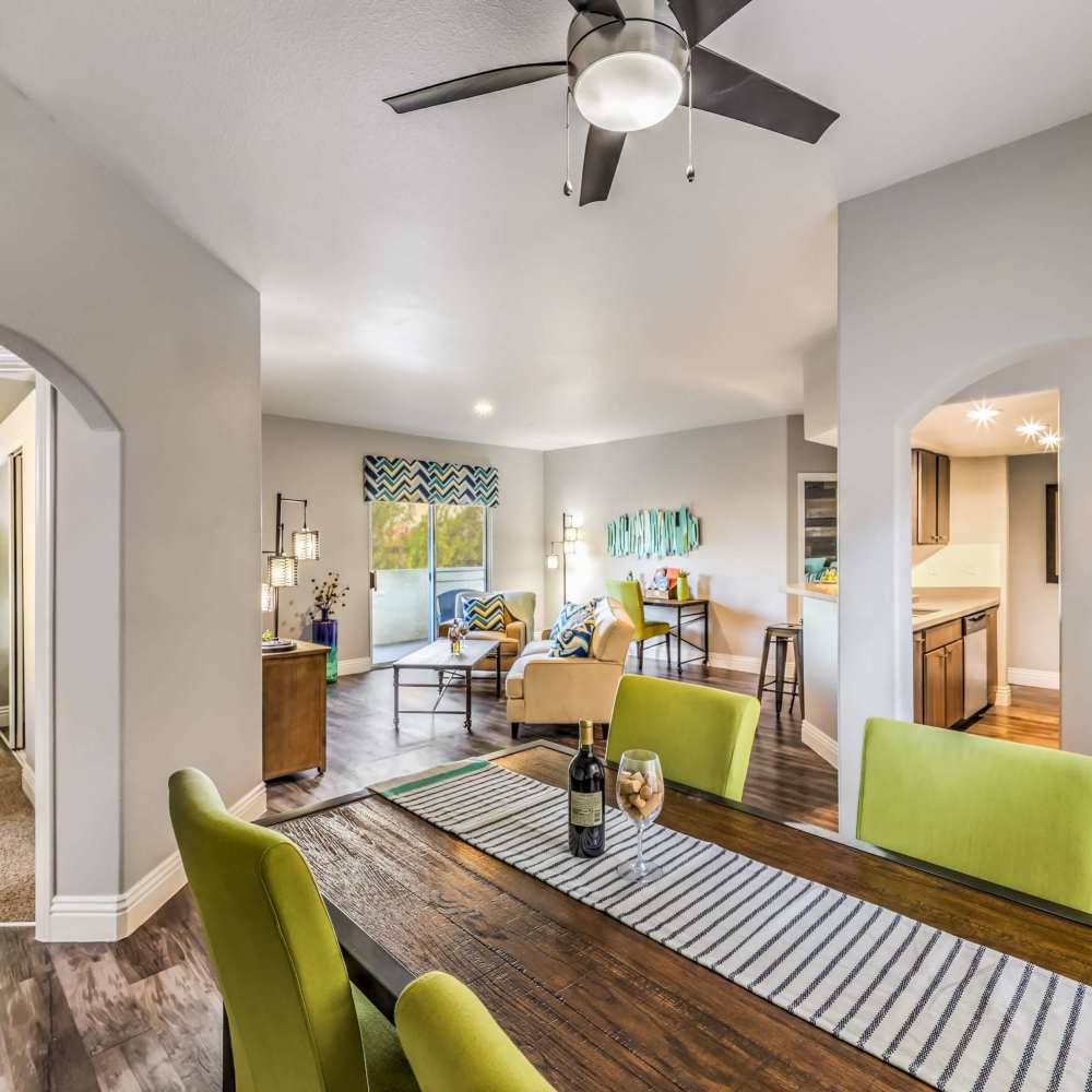 Dinning space with a ceiling fan at Parkway Townhomes in Henderson, Nevada