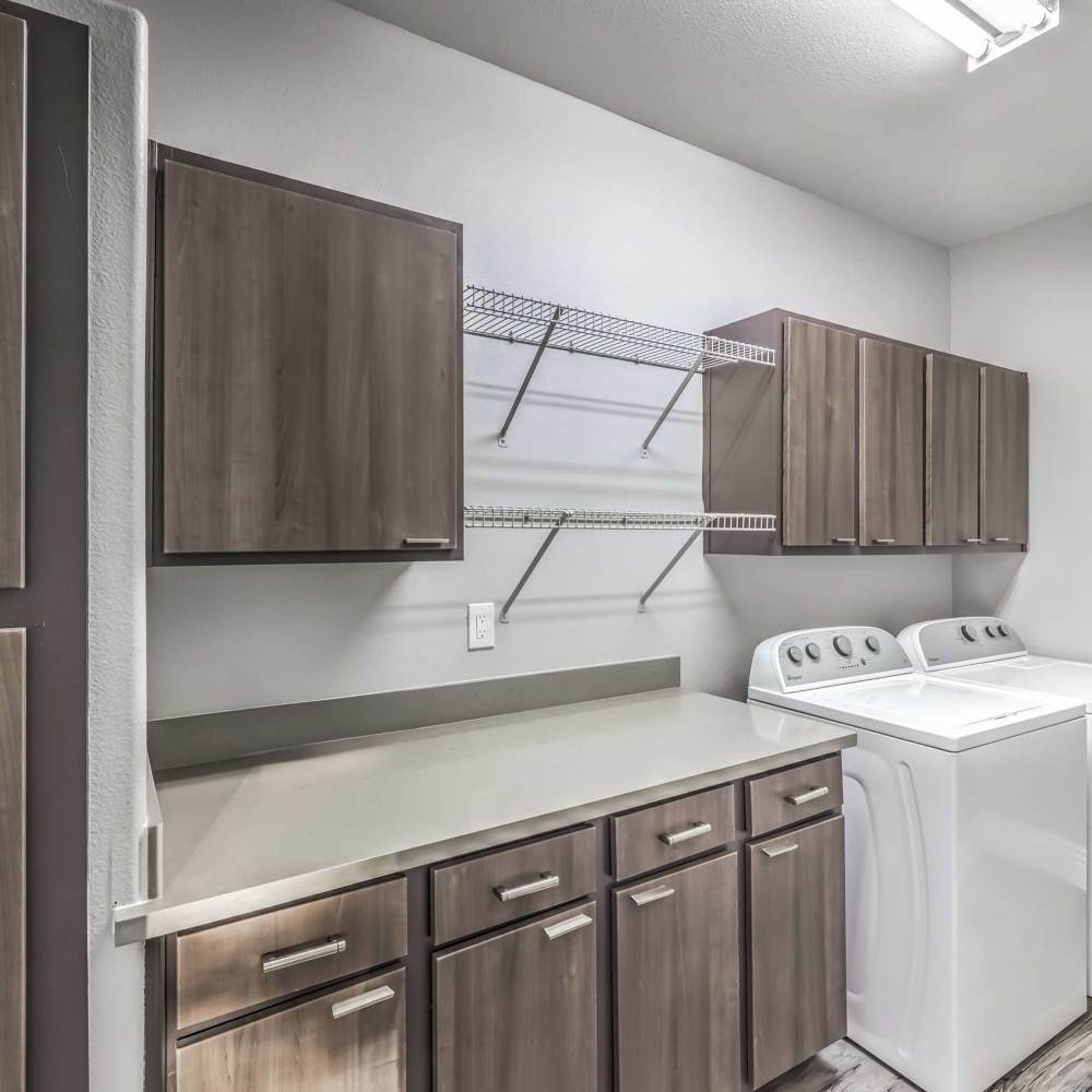 Laundry room with a washer and dryer at Parkway Townhomes in Henderson, Nevada