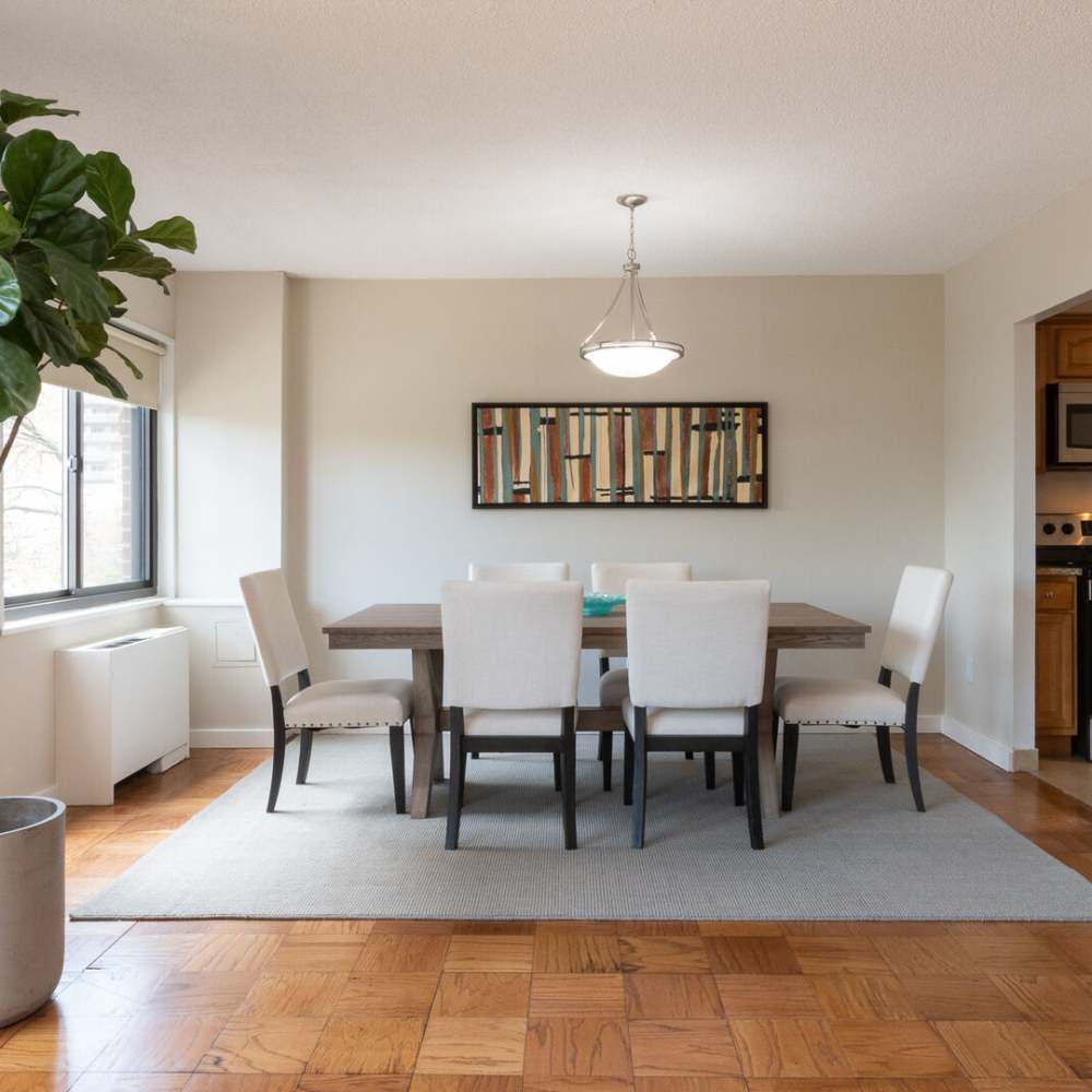 Apartment dining room with hardwood floors at The Pierre in Hackensack, New Jersey