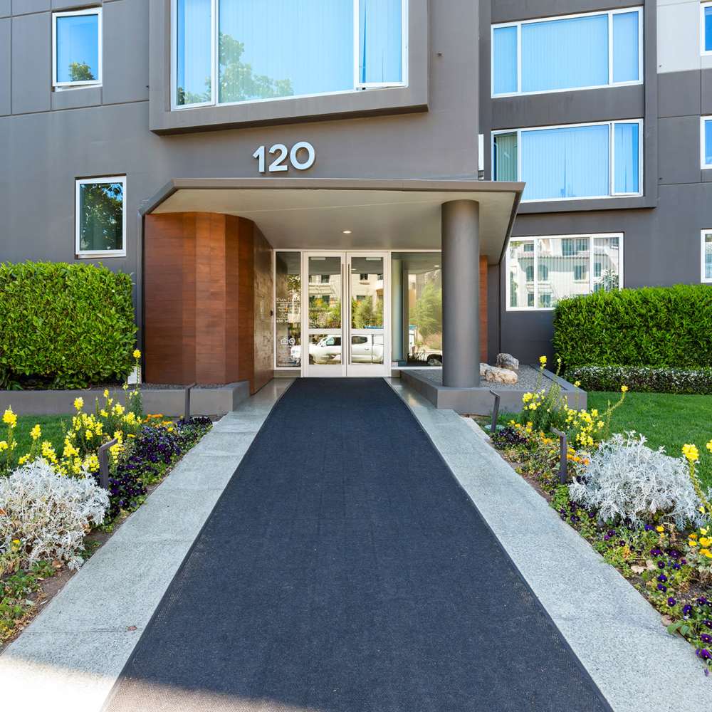 Exterior view of the front entrance at Ryan Tower San Mateo, California