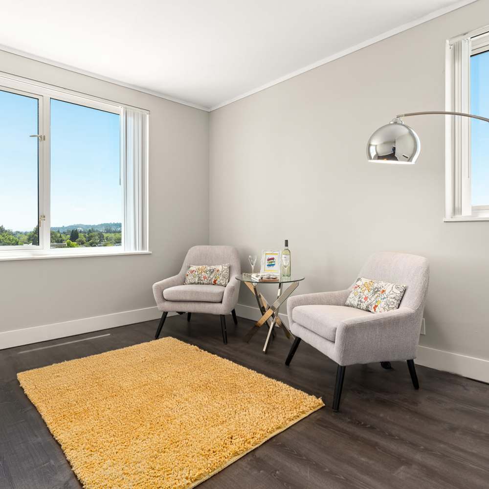 Cozy area with orange rug at Ryan Tower San Mateo, California
