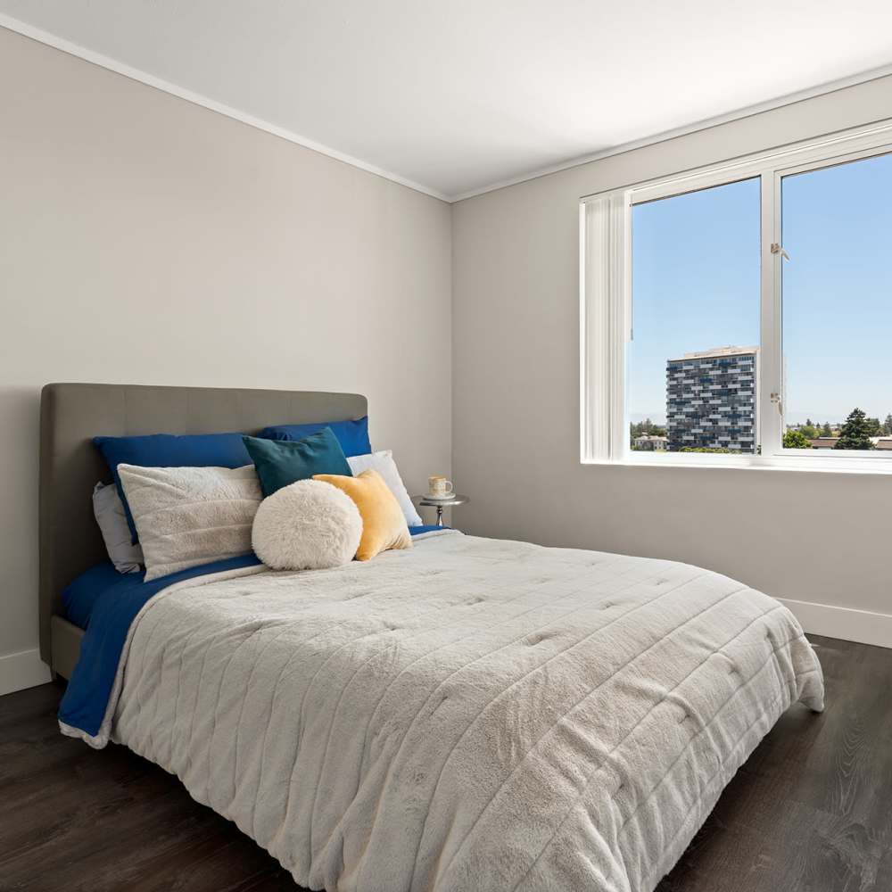 Large bedroom with window at Ryan Tower San Mateo, California