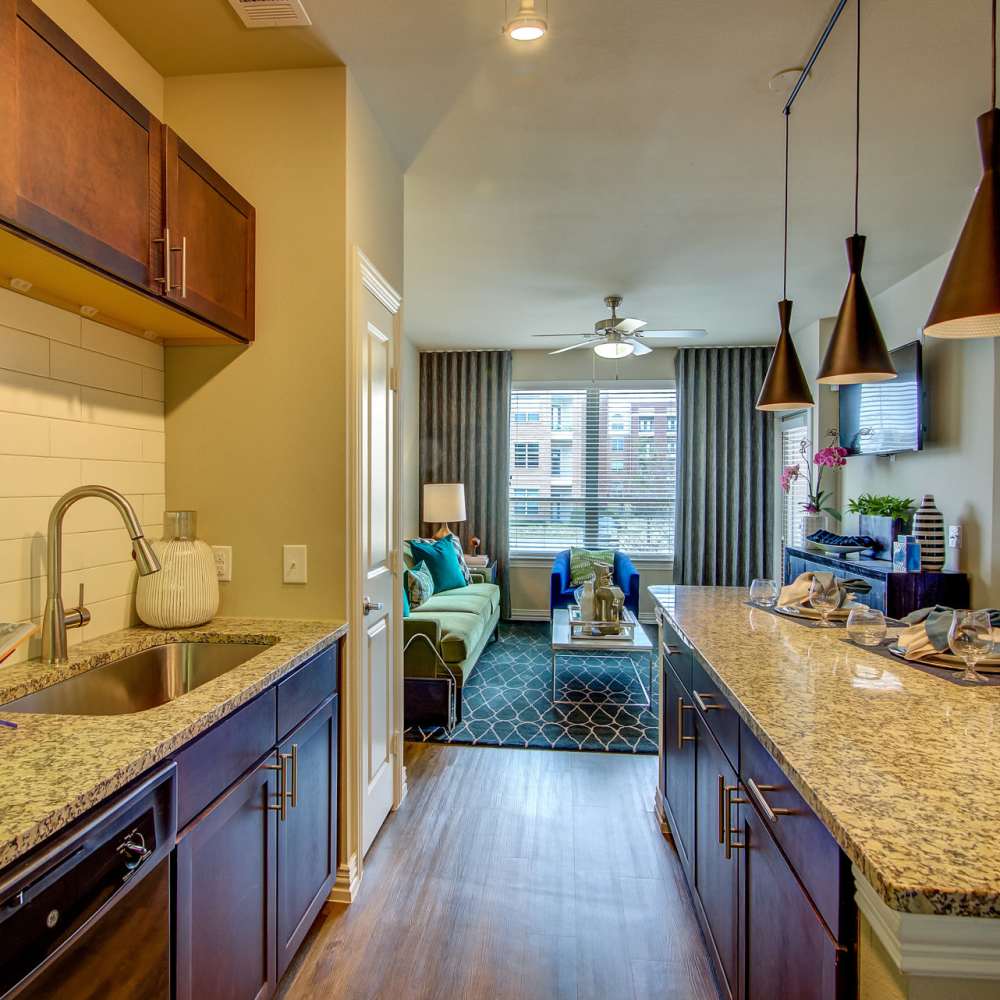 Model kitchen in an apartment at Keller Springs Crossing in Carrollton, Texas