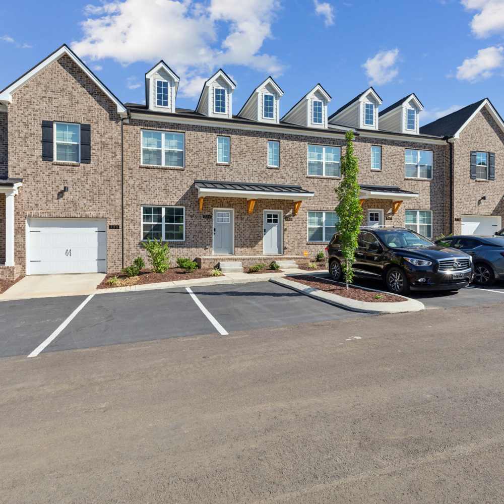 Apartment exterior view with parking at Blakeney Commons in Smyrna, Tennessee