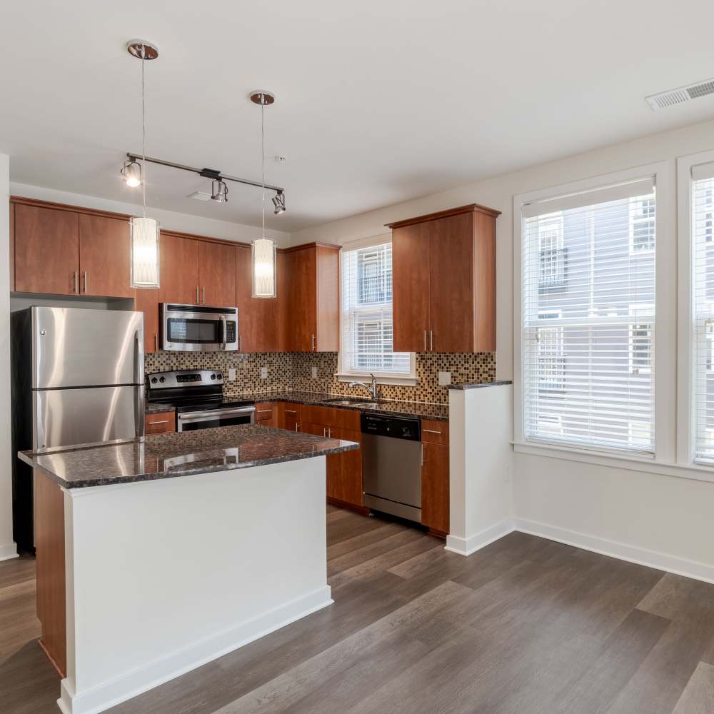 Modern kitchen with stainless steel appliances at The Tala at Washington Hill's] in Baltimore, Maryland