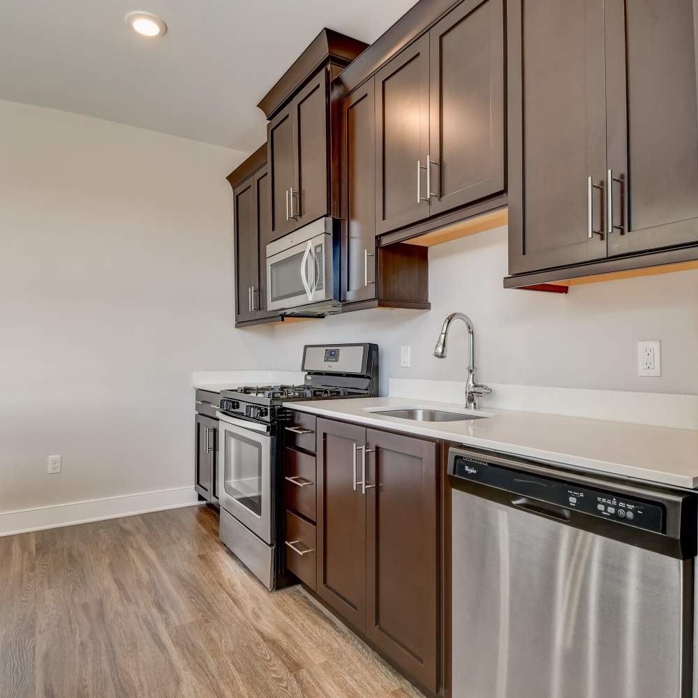 Apartment kitchen with stainless-steel appliances at Station Place in Red Bank, New Jersey