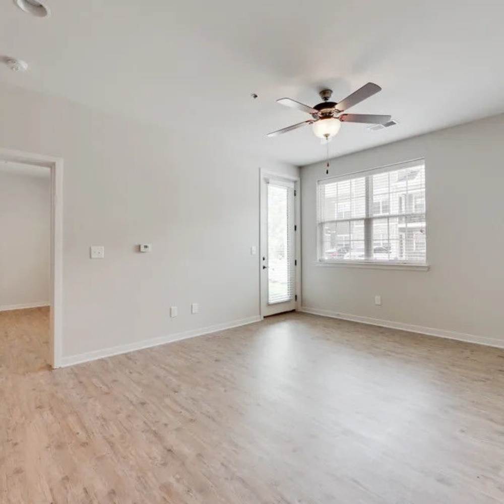 Wood-style flooring in an apartment at Creekside At Deer Crossings in White House, Tennessee