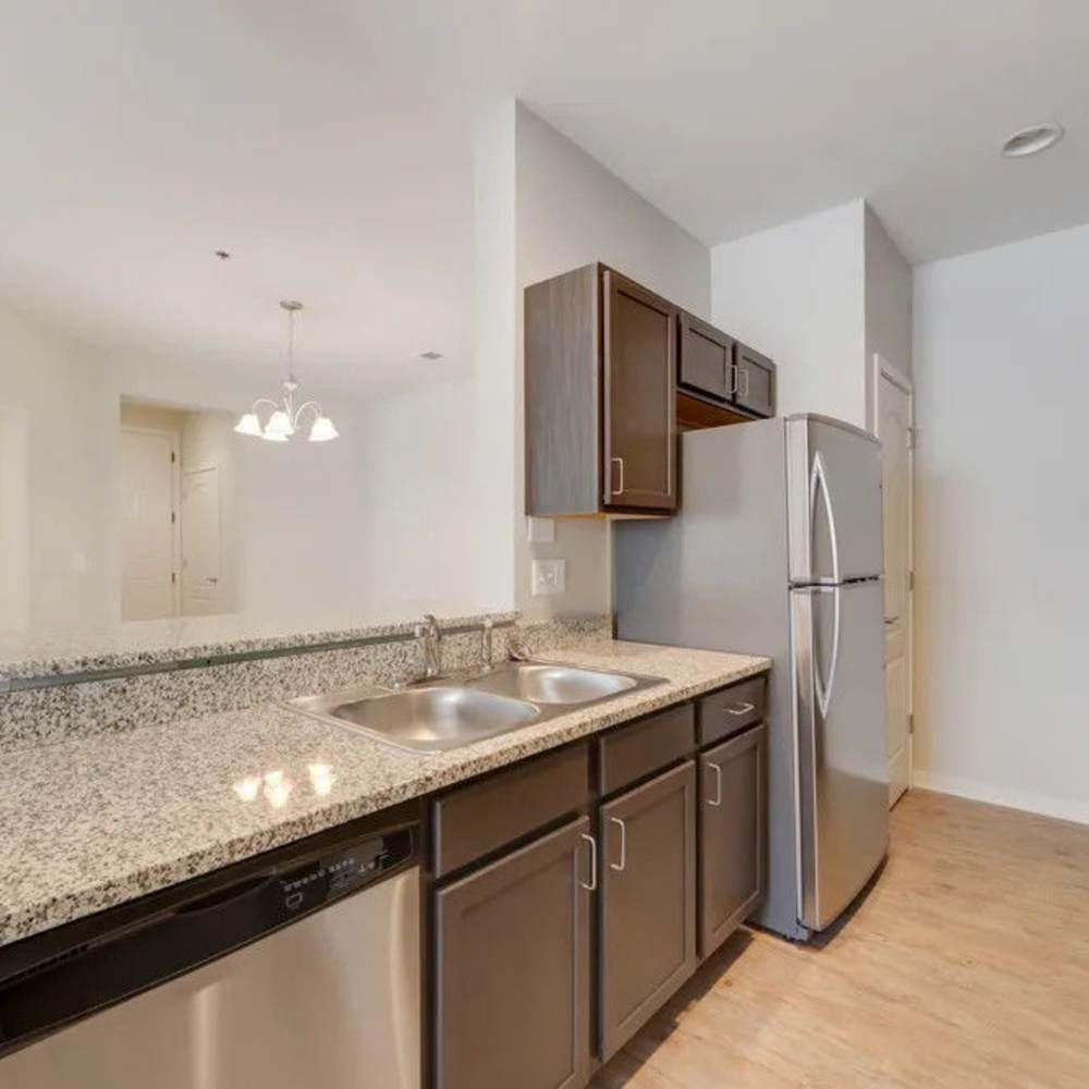 Kitchen with a dishwasher at Creekside At Deer Crossings in White House, Tennessee