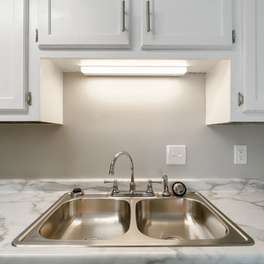 Granite counter in a kitchen at The Flats At Wilkinson in White House, Tennessee