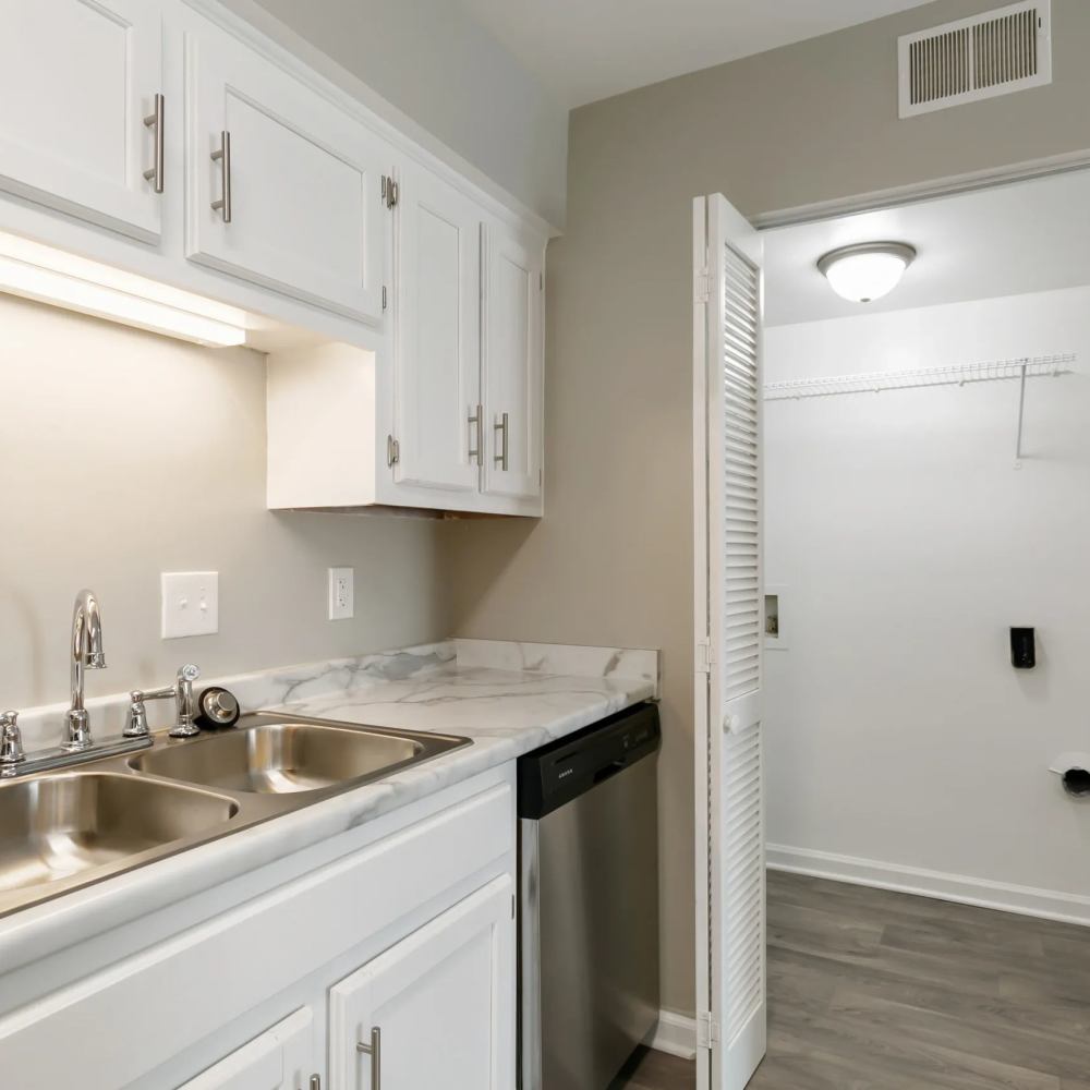 Stainless-steel appliances in a kitchen at The Flats At Wilkinson in White House, Tennessee
