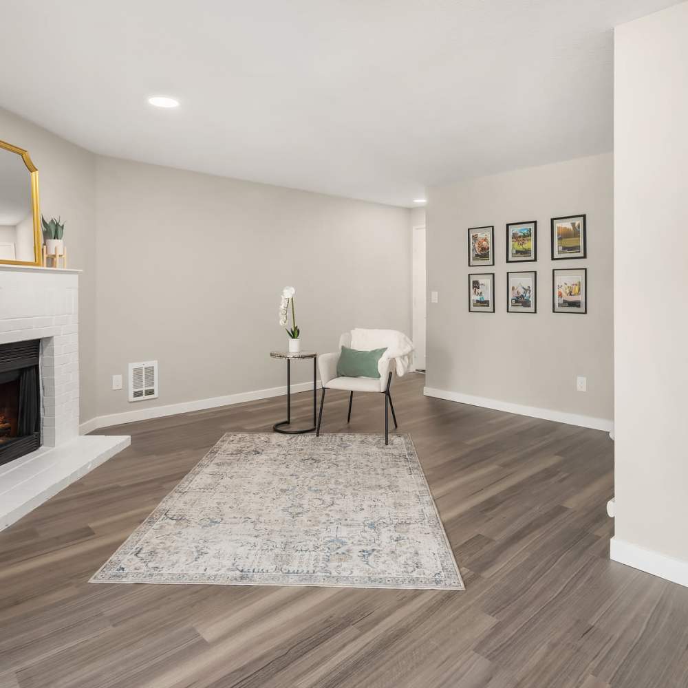 Living space with wood flooring The Summit in Redmond, Washington