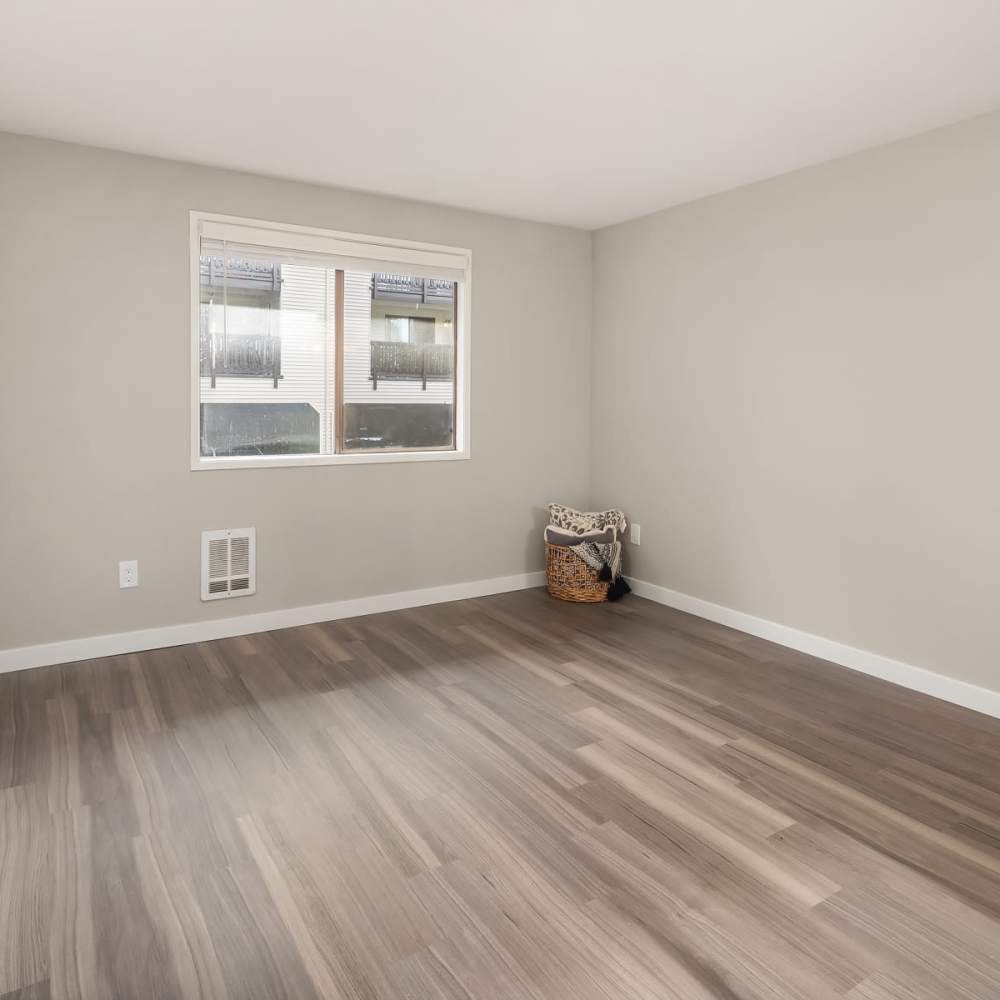 Wood flooring in bedroom The Summit in Redmond, Washington