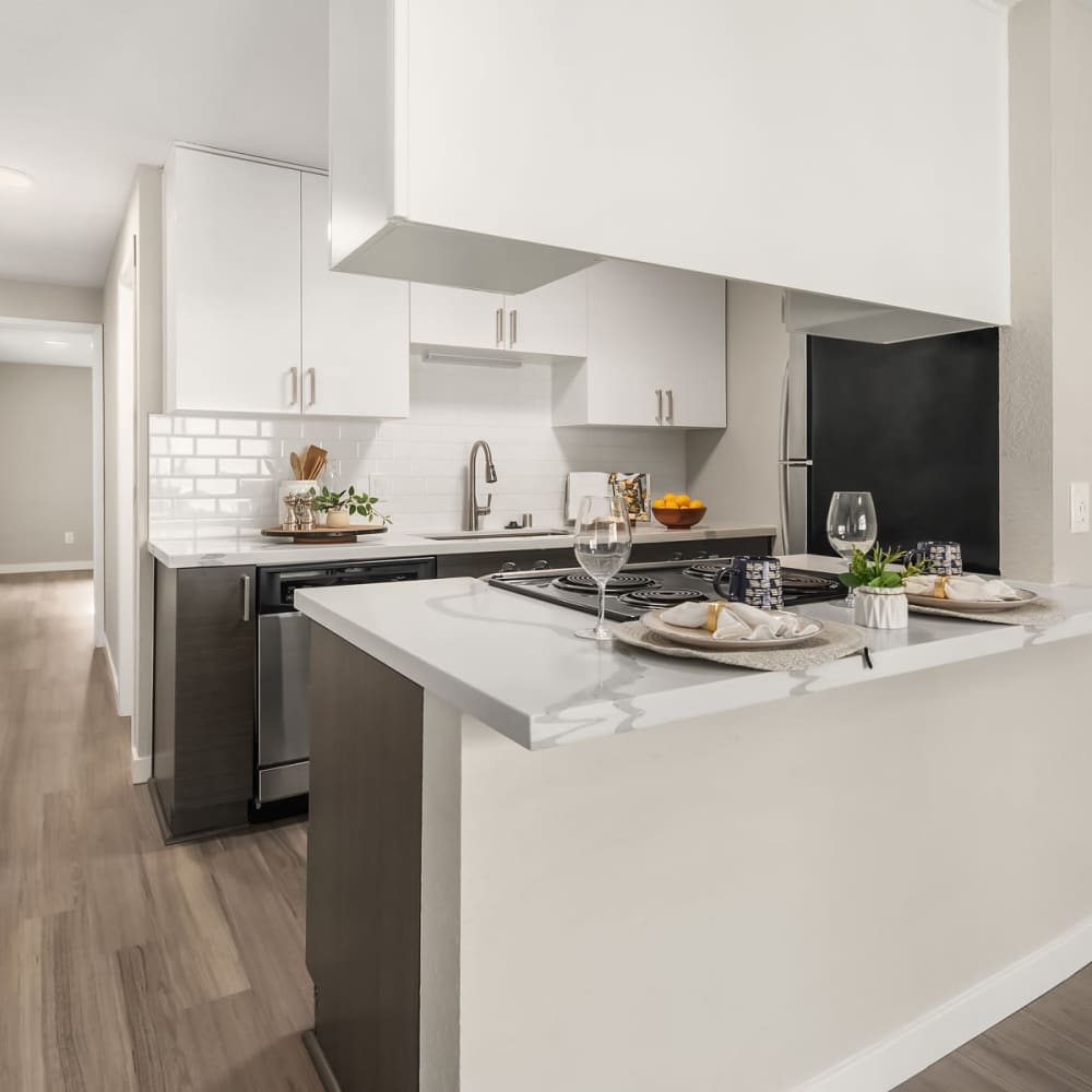 Kitchen with white accents The Summit in Redmond, Washington