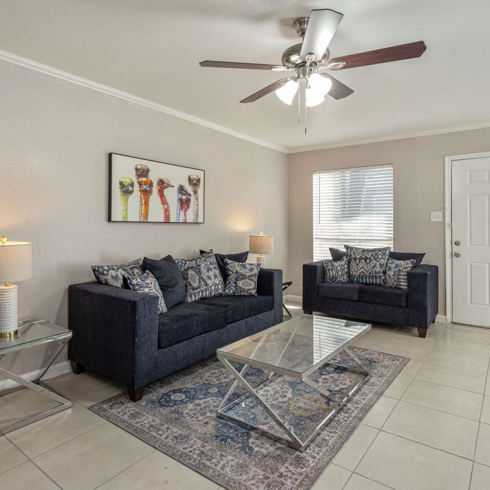 Living space with large windows at Huntington Village And Cambridge Crossing in Houston, Texas