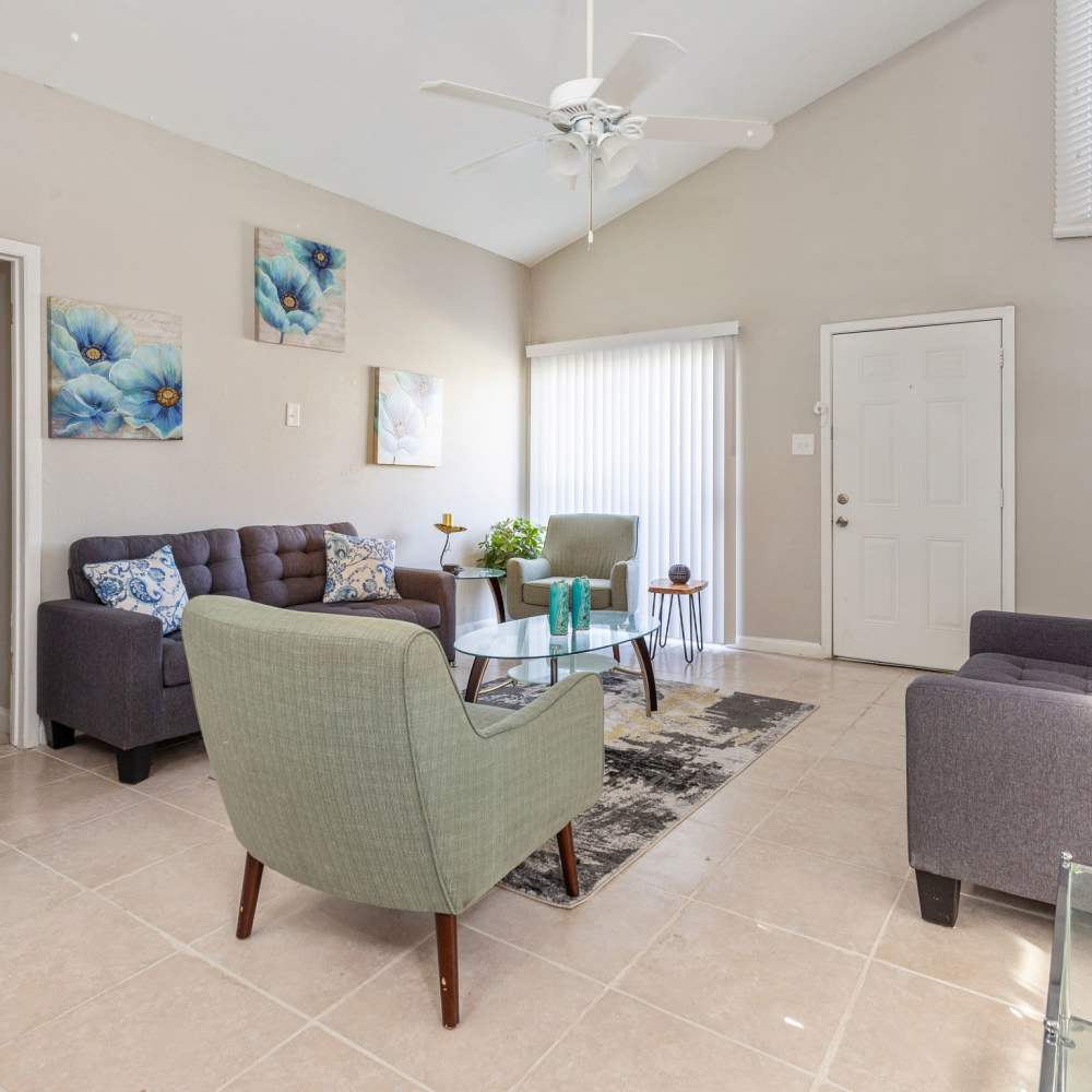 Living space with tile flooring at Huntington Village And Cambridge Crossing in Houston, Texas