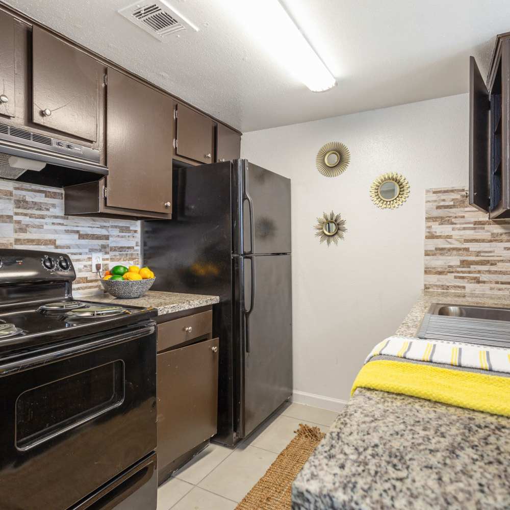 Kitchen with great counter space at Huntington Village And Cambridge Crossing in Houston, Texas