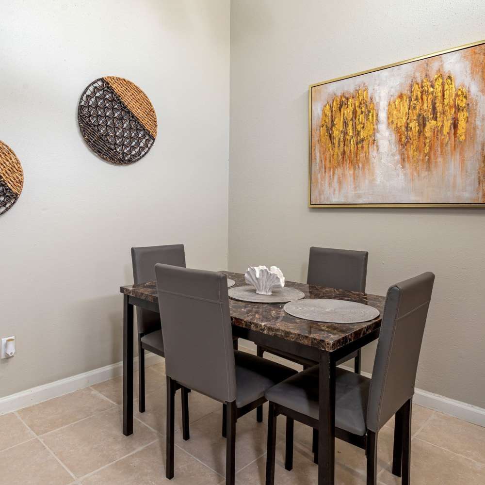 Dinning space with tile flooring at Huntington Village And Cambridge Crossing in Houston, Texas