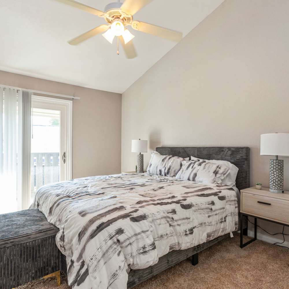 Bedroom with plush carpeting at Huntington Village And Cambridge Crossing in Houston, Texas