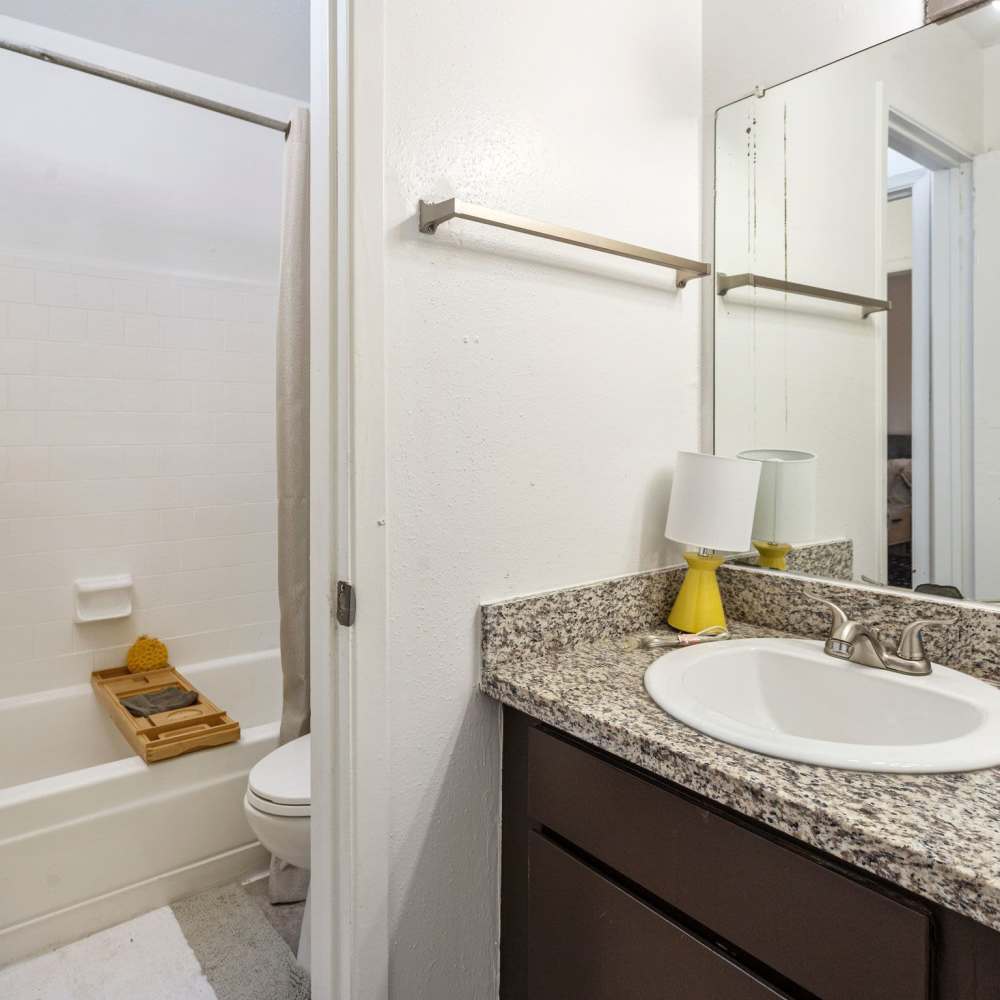 Bathroom with a towel rack at Huntington Village And Cambridge Crossing in Houston, Texas