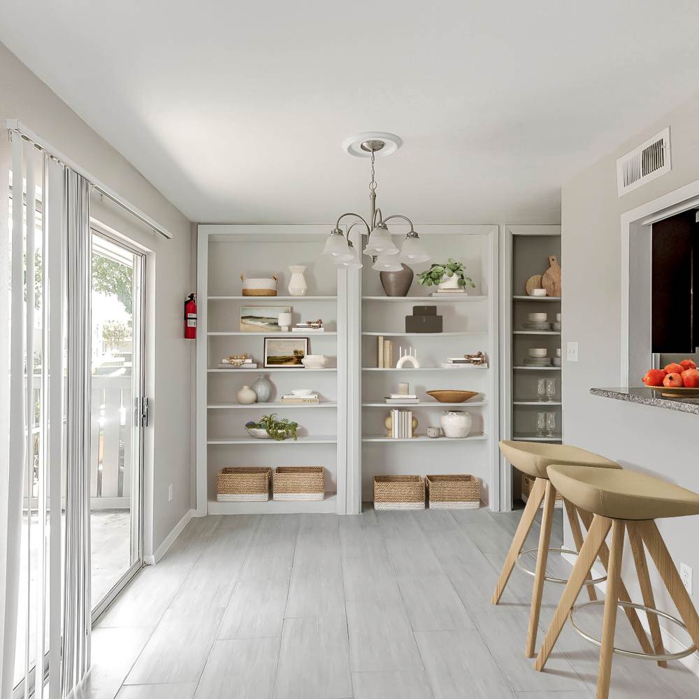 Living space with quick access to the patio or balcony at Huntington Village And Cambridge Crossing in Houston, Texas