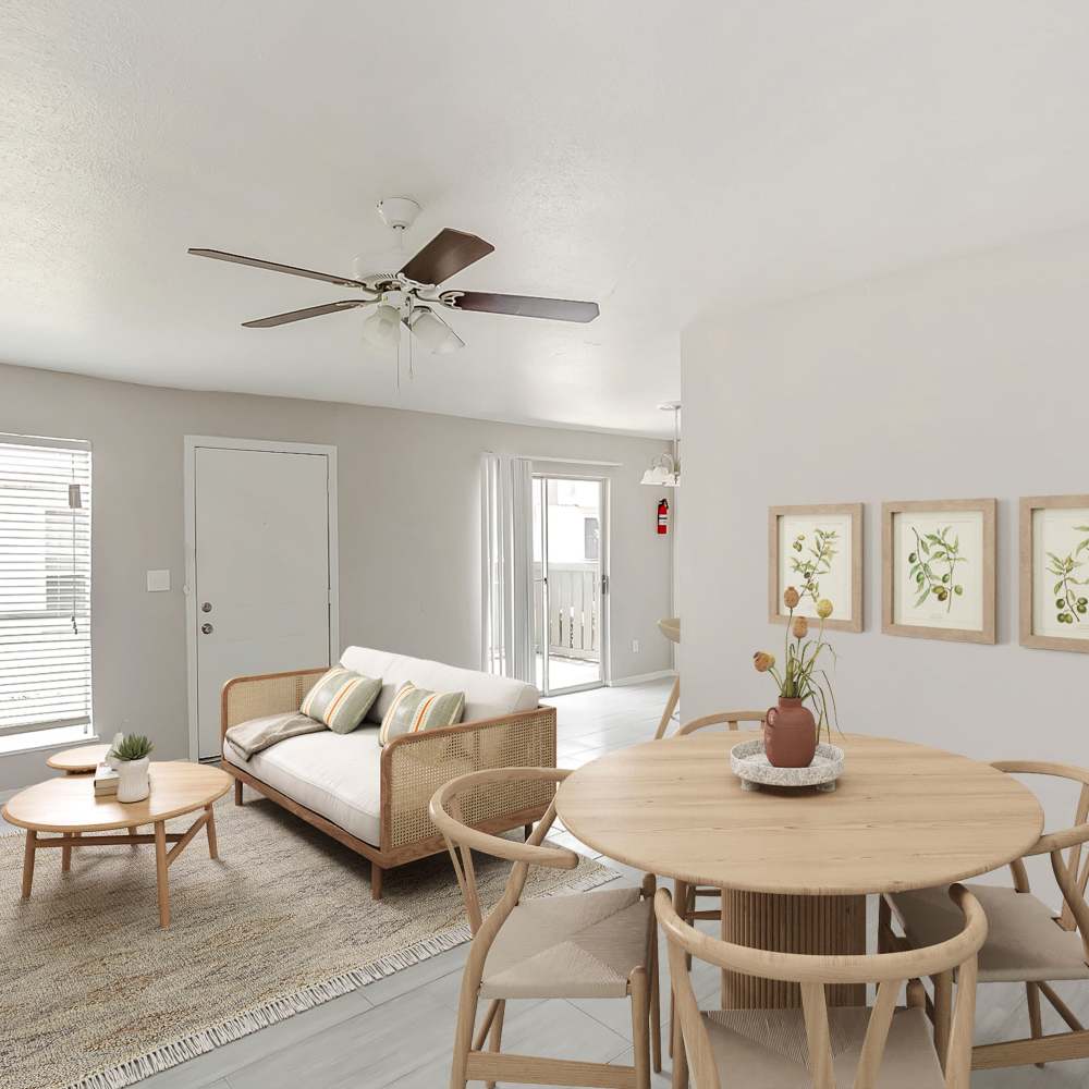 Living space with a ceiling fan at Huntington Village And Cambridge Crossing in Houston, Texas