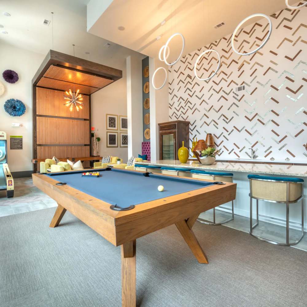 Game room with billiard table at Revl Crockett Row in Fort Worth, Texas