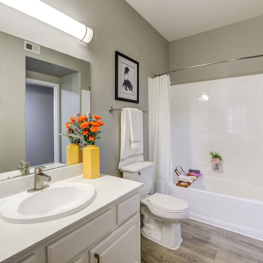 Bathroom with great lighting at Calypso Apartments in Las Vegas, Nevada