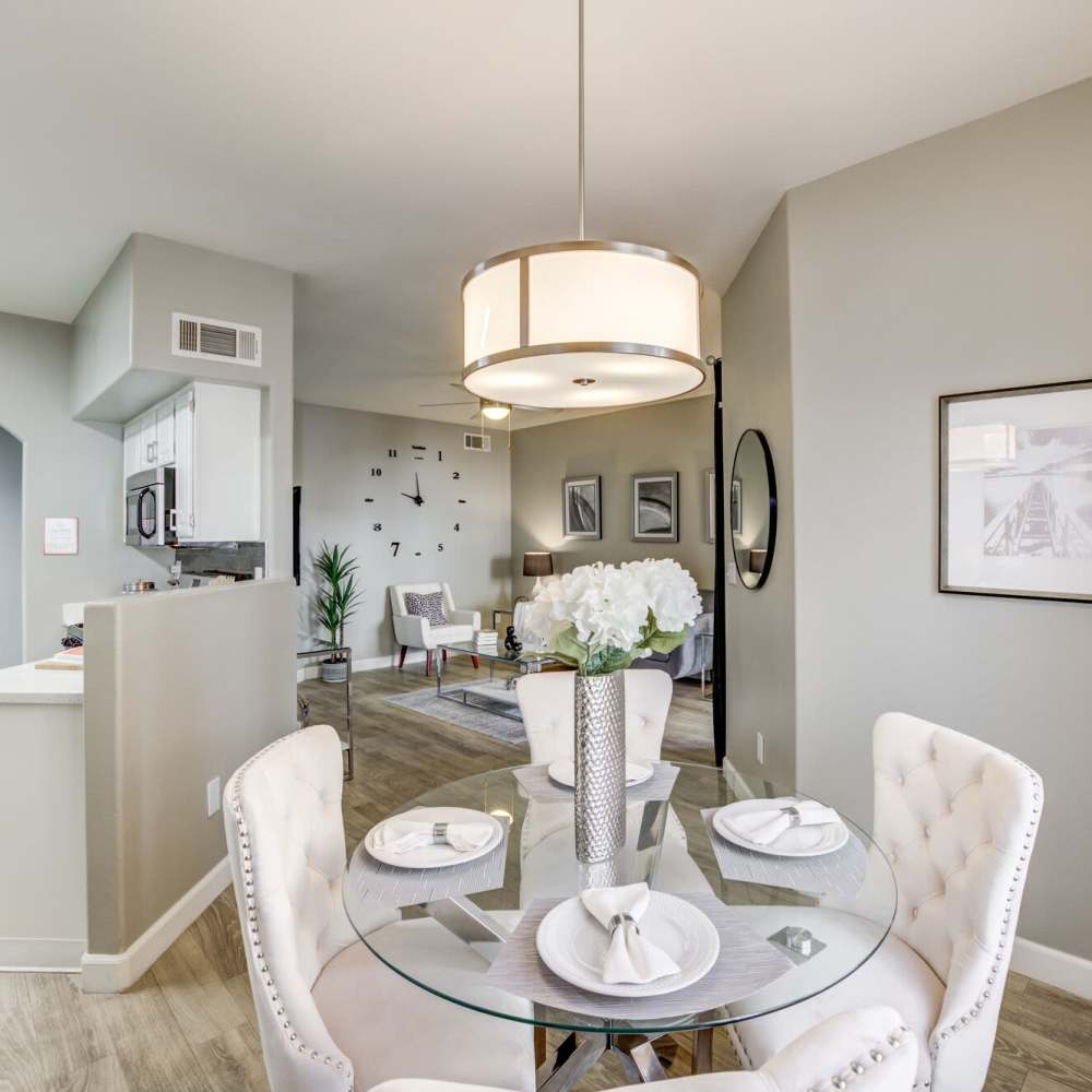 Dinning space with a table and chairs at Calypso Apartments in Las Vegas, Nevada