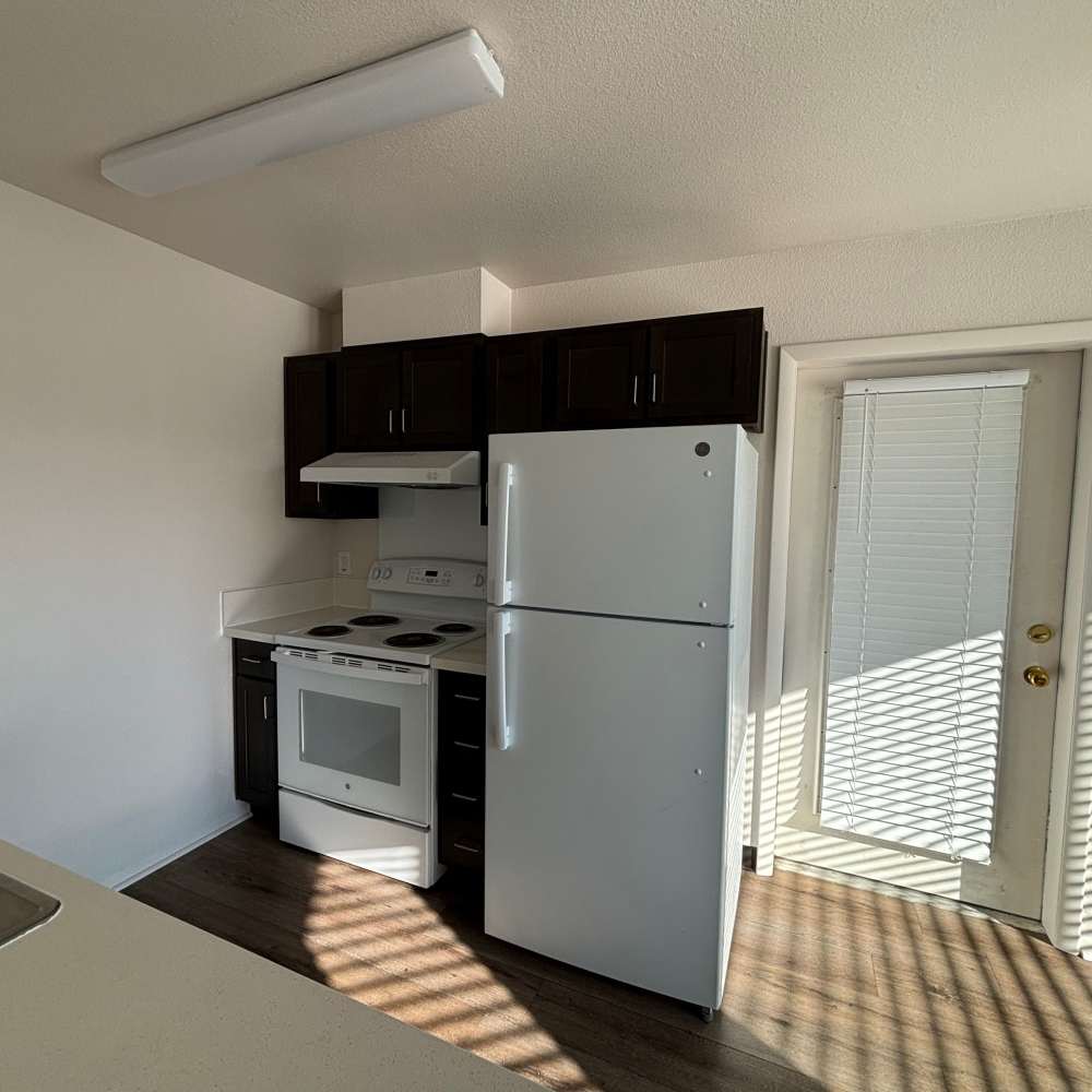 Happy family in a home at Castlebar Apartments in Bozeman, Montana