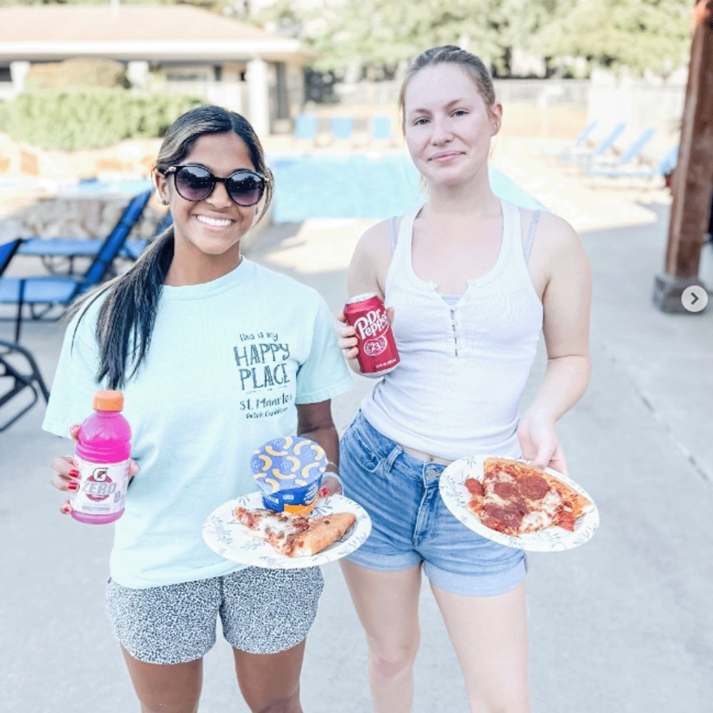 Students enjoying food near The Landing Lawrence in Lawrence, Kansas